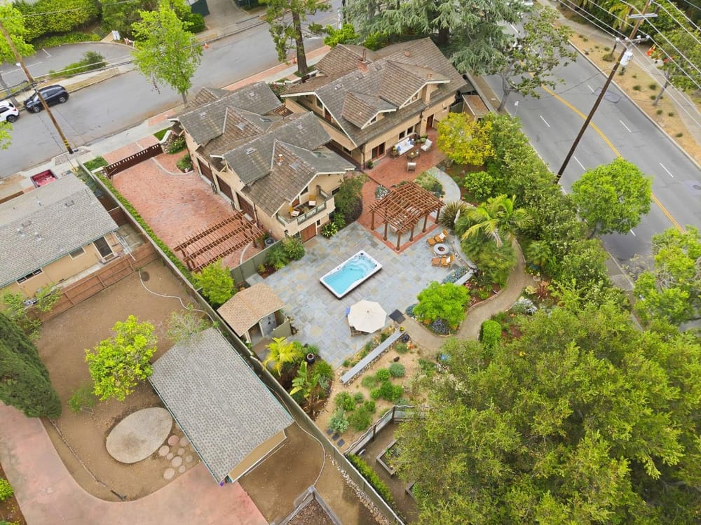 Aerial view showing full estate and adjacent parcel potential
