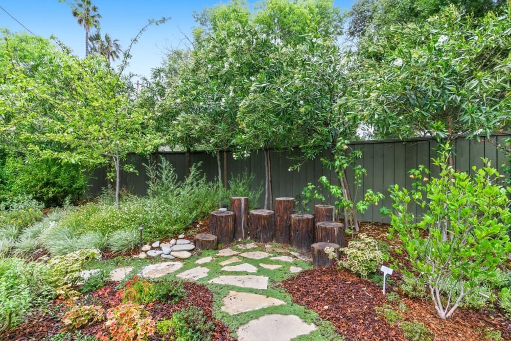 Garden pathway with stepping stones and mature plantings